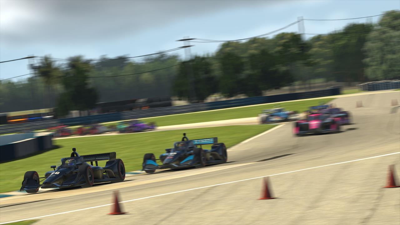 Sage Karam takes the lead over Alex Palou during Race 3 of the INDYCAR iRacing Challenge Season 2 at the virtual Sebring International Raceway -- Photo by:  Photo Courtesy of iRacing